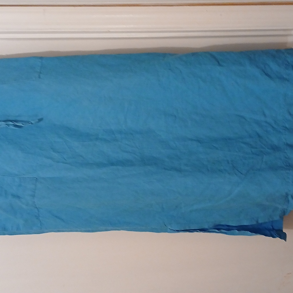 Aqua light blue skirt with pockets in the front and a split on the side - Picture 3 of 5